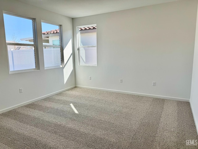 view of carpeted spare room