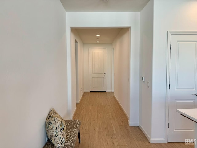 hallway featuring light hardwood / wood-style flooring