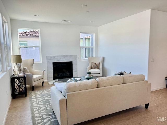 living room with light hardwood / wood-style floors