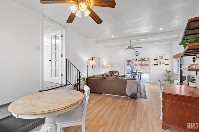 dining area with light wood finished floors, beamed ceiling, stairway, recessed lighting, and a ceiling fan