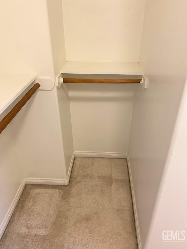 6622 Rimridge Way, Bakersfield, CA 93313 - spacious closet featuring carpet flooring