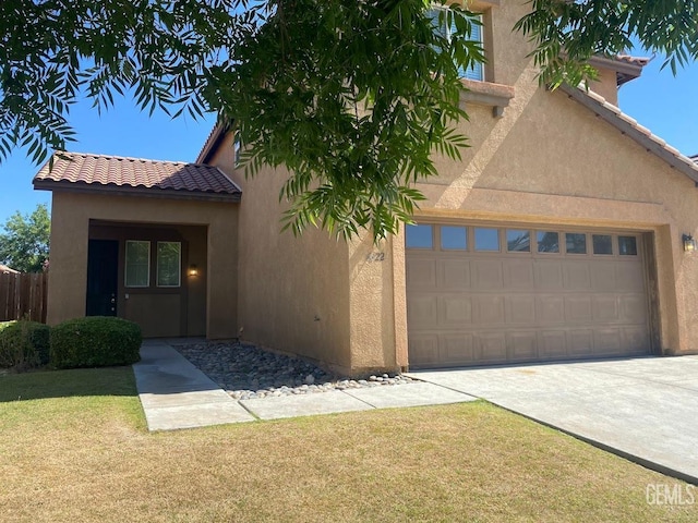 6622 Rimridge Way, Bakersfield, CA 93313 - mediterranean / spanish home featuring a garage, stucco siding, driveway, and a tile roof