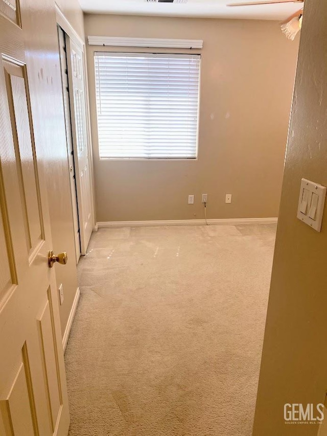 6622 Rimridge Way, Bakersfield, CA 93313 - unfurnished room featuring light carpet and baseboards