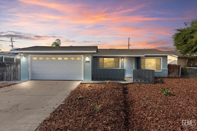 single story home featuring a garage