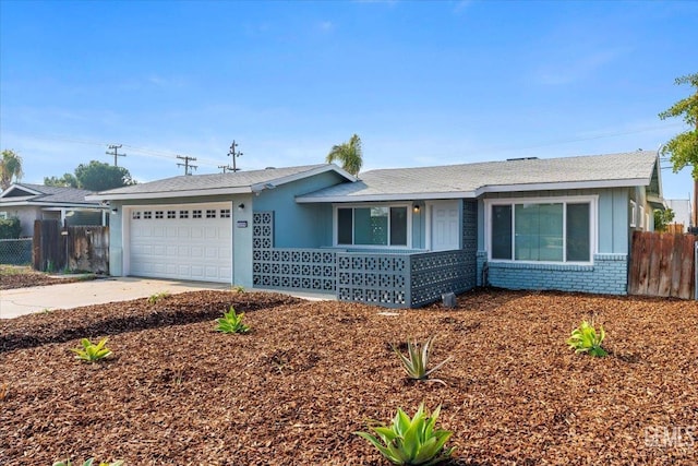 single story home with a garage