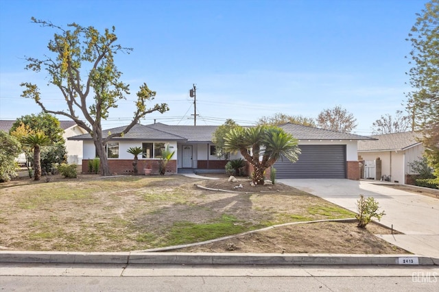 ranch-style house featuring a garage