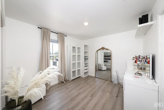 6028 Bogart Dr, Bakersfield, CA 93313 - living area with light wood-type flooring, baseboards, and recessed lighting