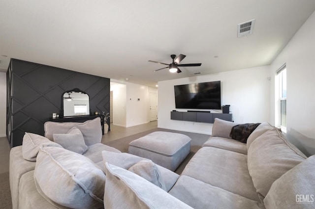 6028 Bogart Dr, Bakersfield, CA 93313 - carpeted living area with a ceiling fan and baseboards