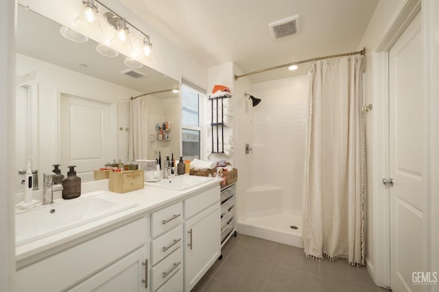 6028 Bogart Dr, Bakersfield, CA 93313 - full bath with tile patterned floors, curtained shower, and double vanity
