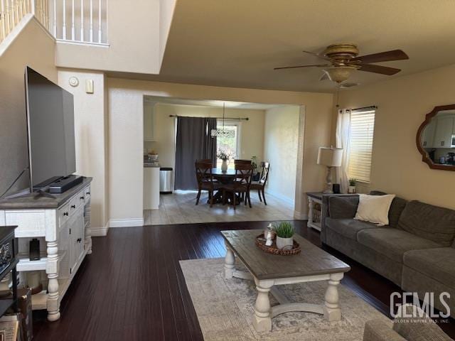 302 Quaking Aspen Ave, Wasco, CA 93280 - living area with ceiling fan and dark wood-style flooring