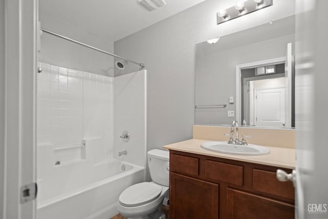 full bathroom with vanity, toilet, and washtub / shower combination