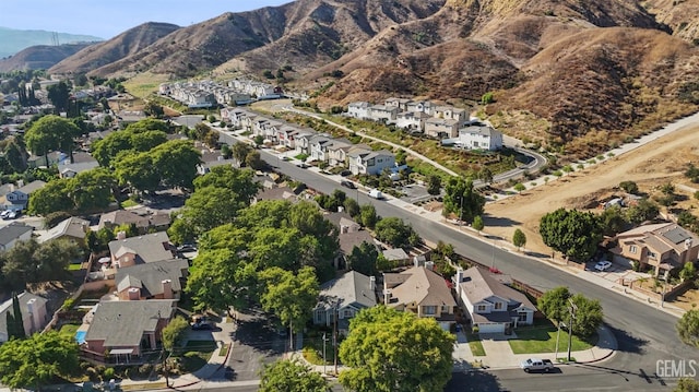 drone / aerial view with a residential view and a mountain view