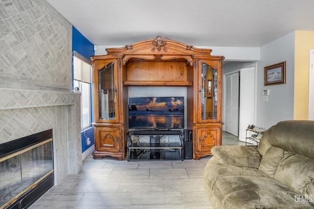 living room featuring a fireplace