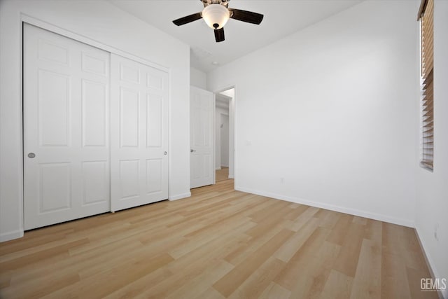 9702 Petersburg Pl, Bakersfield, CA 93306 - unfurnished bedroom with light wood-type flooring, baseboards, a closet, and a ceiling fan