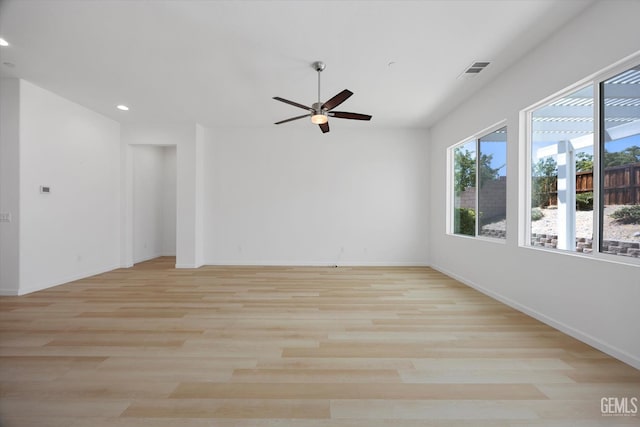 9702 Petersburg Pl, Bakersfield, CA 93306 - spare room featuring healthy amount of natural light, ceiling fan, recessed lighting, and baseboards