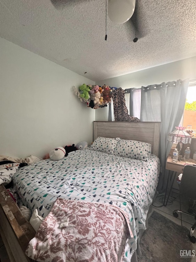 bedroom featuring a textured ceiling