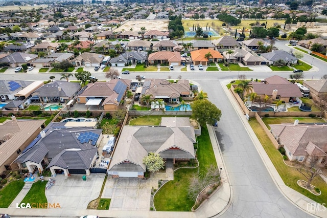 drone / aerial view with a residential view