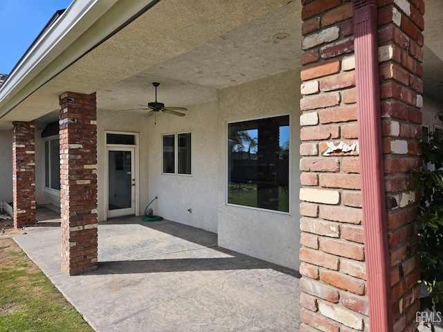 view of patio featuring a ceiling fan