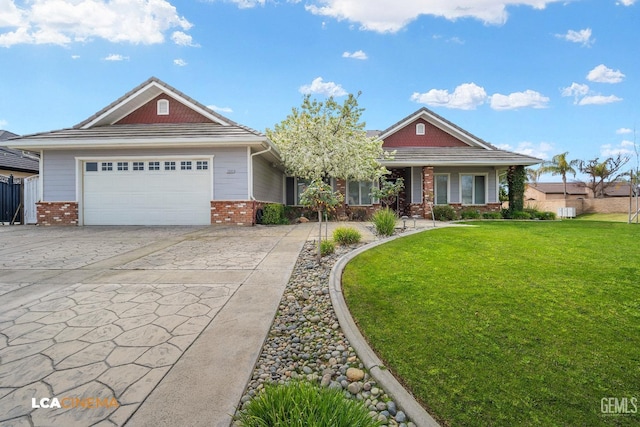 view of front facade with a garage, concrete driveway, brick siding, and a front yard