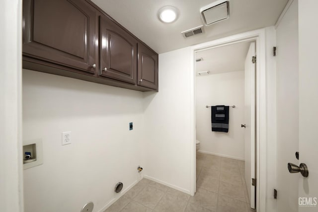 6008 Alderpointe St, Bakersfield, CA 93313 - laundry room with hookup for a washing machine, cabinet space, baseboards, hookup for an electric dryer, and light tile patterned floors