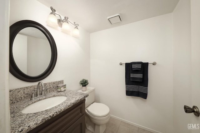 6008 Alderpointe St, Bakersfield, CA 93313 - bathroom featuring toilet, vanity, tile patterned floors, and baseboards