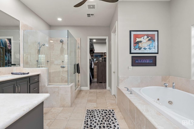 1904 Cricket Park Ct, Bakersfield, CA 93311 - full bath with a stall shower, vanity, a tub with jets, a ceiling fan, and a walk in closet