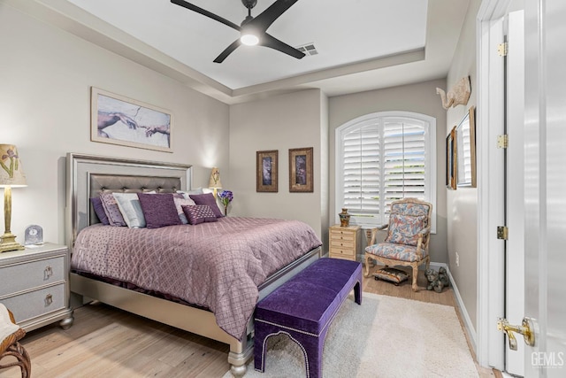 1904 Cricket Park Ct, Bakersfield, CA 93311 - bedroom featuring light wood-style floors, a ceiling fan, and baseboards