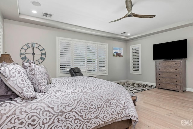 1904 Cricket Park Ct, Bakersfield, CA 93311 - bedroom featuring wood finished floors, a raised ceiling, recessed lighting, and baseboards