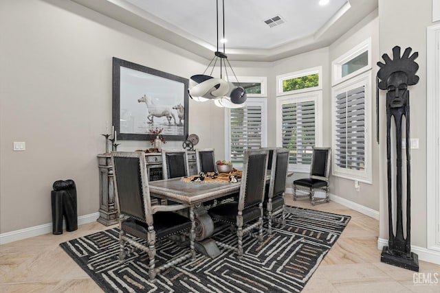1904 Cricket Park Ct, Bakersfield, CA 93311 - dining space with a tray ceiling and baseboards