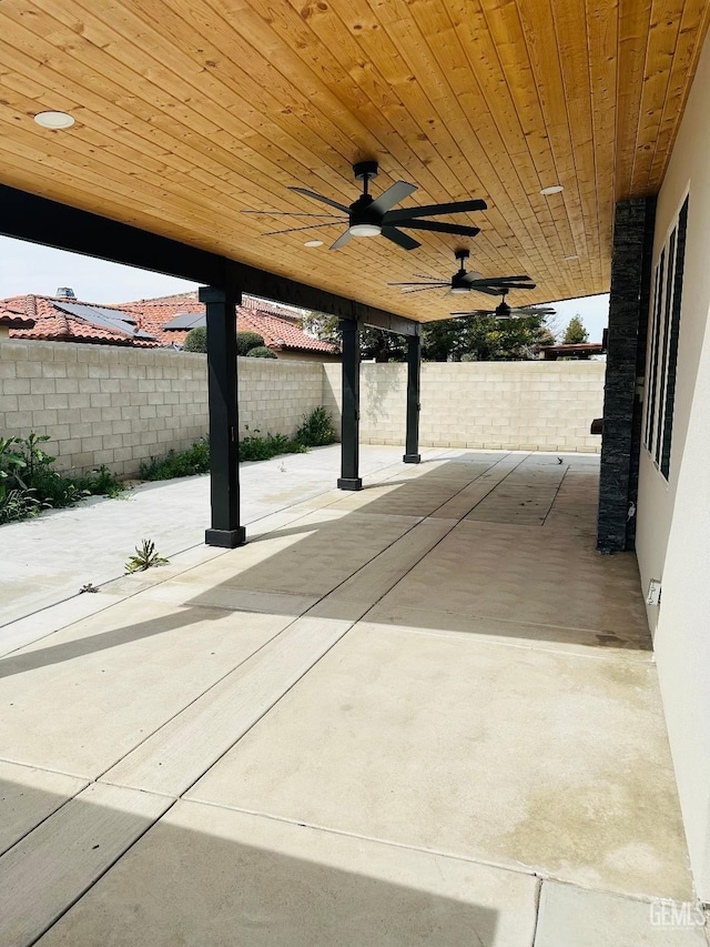 view of patio / terrace with a fenced backyard and a ceiling fan