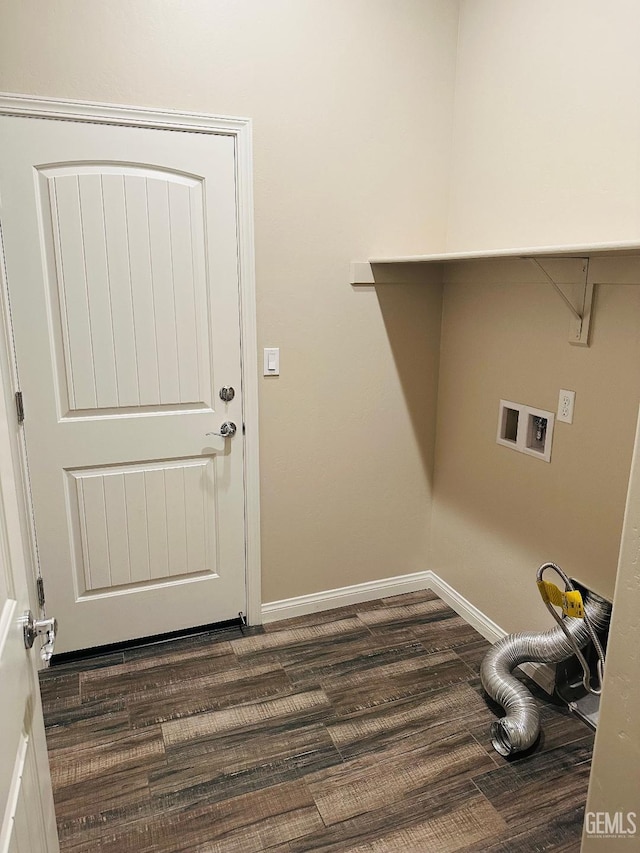 clothes washing area featuring dark wood finished floors, baseboards, washer hookup, and laundry area