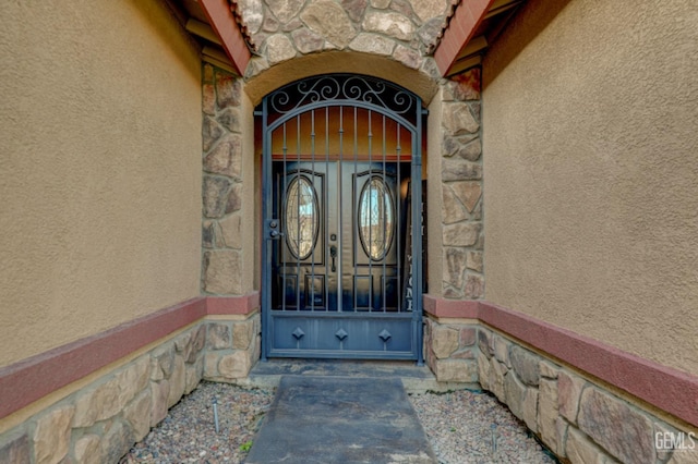 4716 Ambrister Dr, Bakersfield, CA 93313 - entrance to property with stucco siding and stone siding
