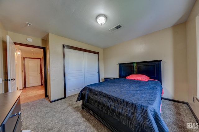 4716 Ambrister Dr, Bakersfield, CA 93313 - bedroom featuring carpet flooring, a closet, visible vents, and baseboards