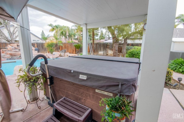 view of patio with central AC unit, a fenced backyard, a fenced in pool, and a hot tub