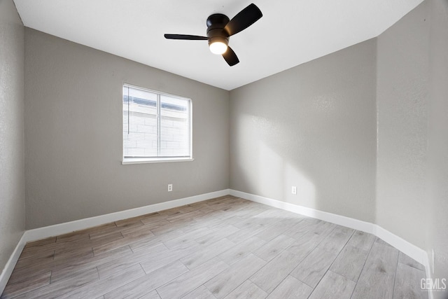 unfurnished room featuring ceiling fan and light hardwood / wood-style flooring