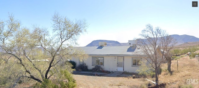 view of front of house with a mountain view