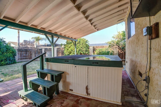 view of patio / terrace featuring a hot tub