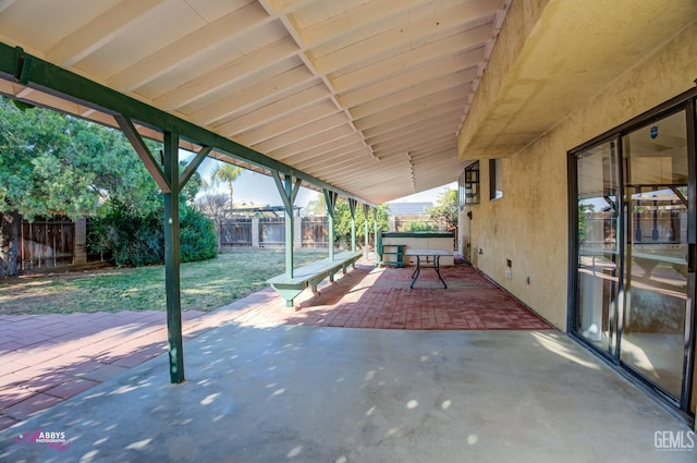 view of patio with a hot tub