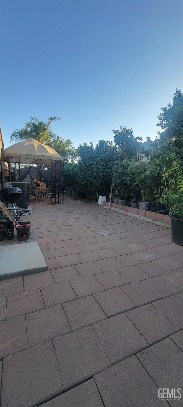 view of patio featuring a gazebo