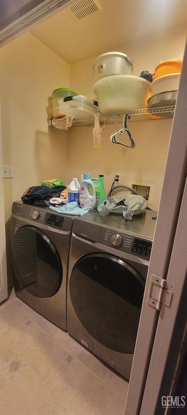 laundry room featuring washer and dryer