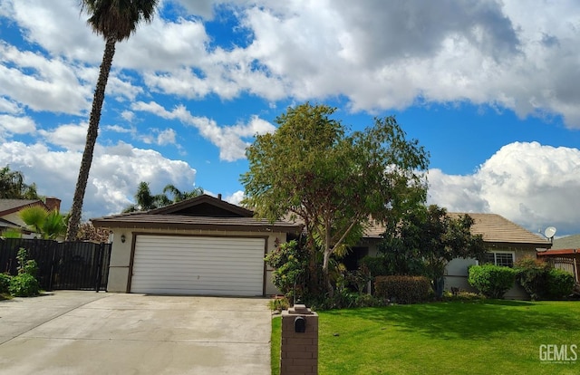 ranch-style house with stucco siding, concrete driveway, an attached garage, a front yard, and fence