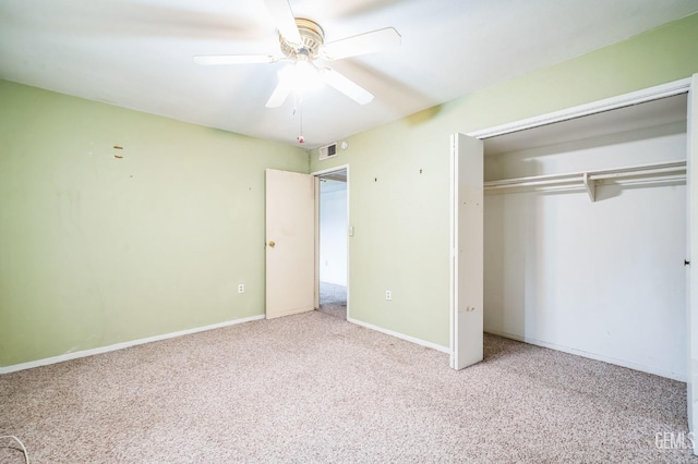 unfurnished bedroom with light carpet, a closet, and ceiling fan