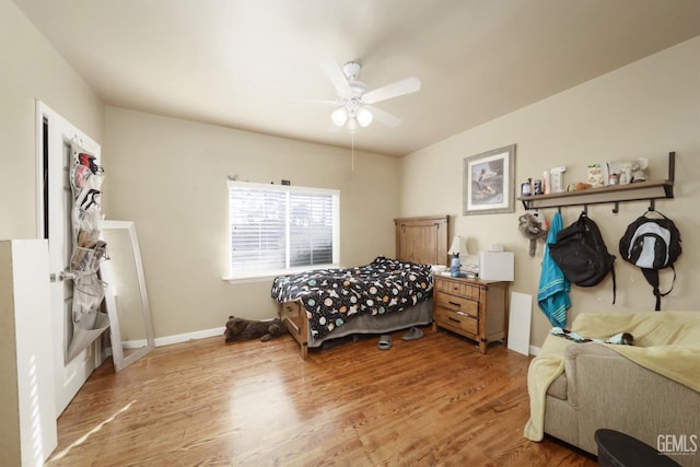 bedroom featuring ceiling fan and light wood-type flooring