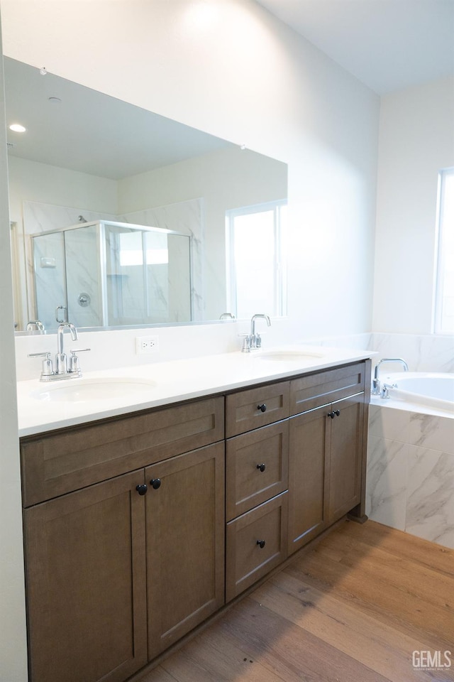 12706 Kinnick Ct, Bakersfield, CA 93311 - bathroom with double vanity, healthy amount of natural light, and a marble finish shower