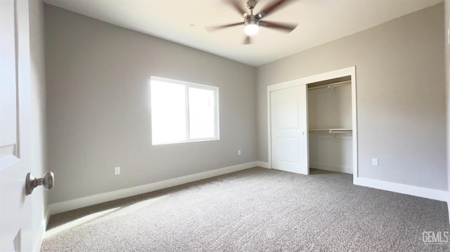 unfurnished bedroom with carpet floors, a closet, a ceiling fan, and baseboards