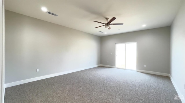 empty room featuring visible vents, baseboards, a ceiling fan, carpet, and recessed lighting