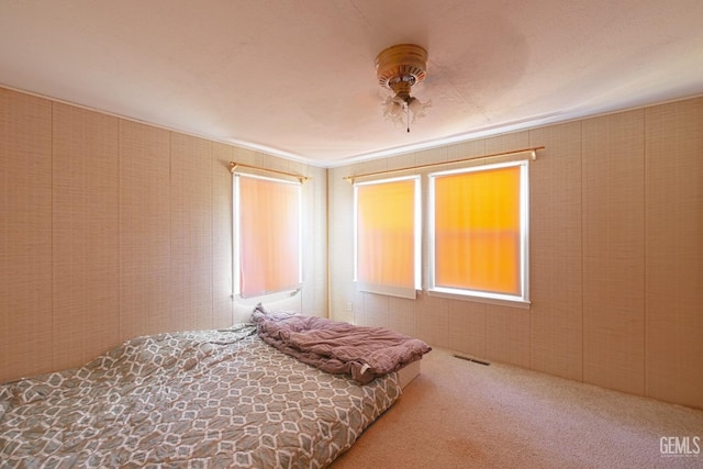 bedroom with carpet and ceiling fan