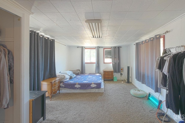 bedroom with carpet and ornamental molding