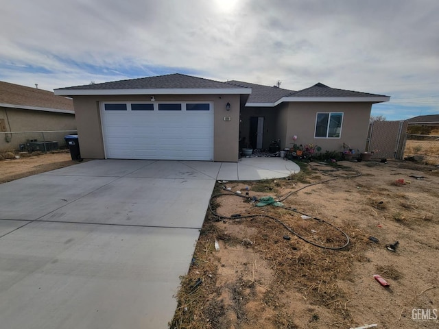 single story home featuring a garage