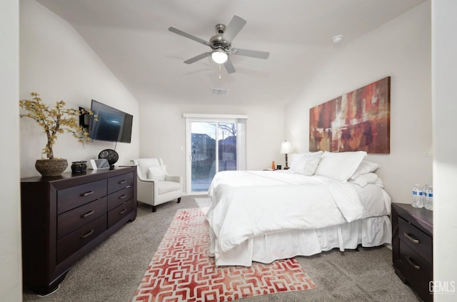 carpeted bedroom with vaulted ceiling, access to outside, ceiling fan, and visible vents